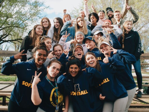 Group of fans cheering on their team