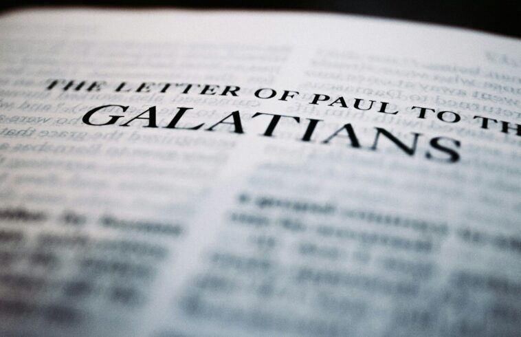 A close-up image of a book page with the title "The Letter of Paul to the Galatians" in bold text, with the rest of the text blurred in the background.